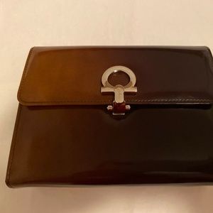 Salvatore Ferragamo leather clutch bag